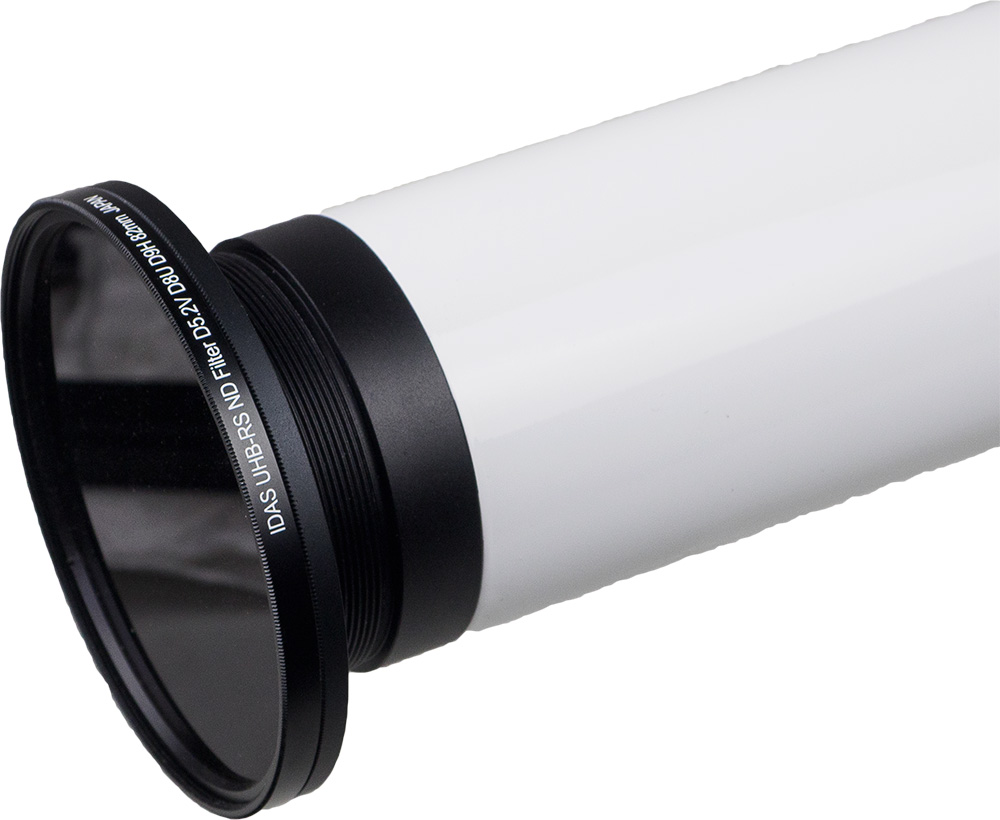 Close-up of an IDAS UH-BRS ND filter with a black rim and fitted to a white lens.